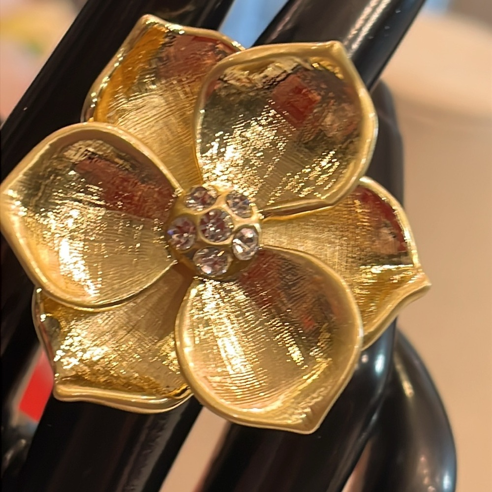 Cocktail Gold tone Flower Ring. Center Clear Rhinestones. Conversation piece.